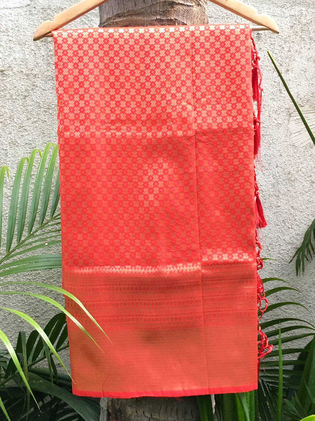 Elegant Kanjivaram red silk saree with intricate woven designs
