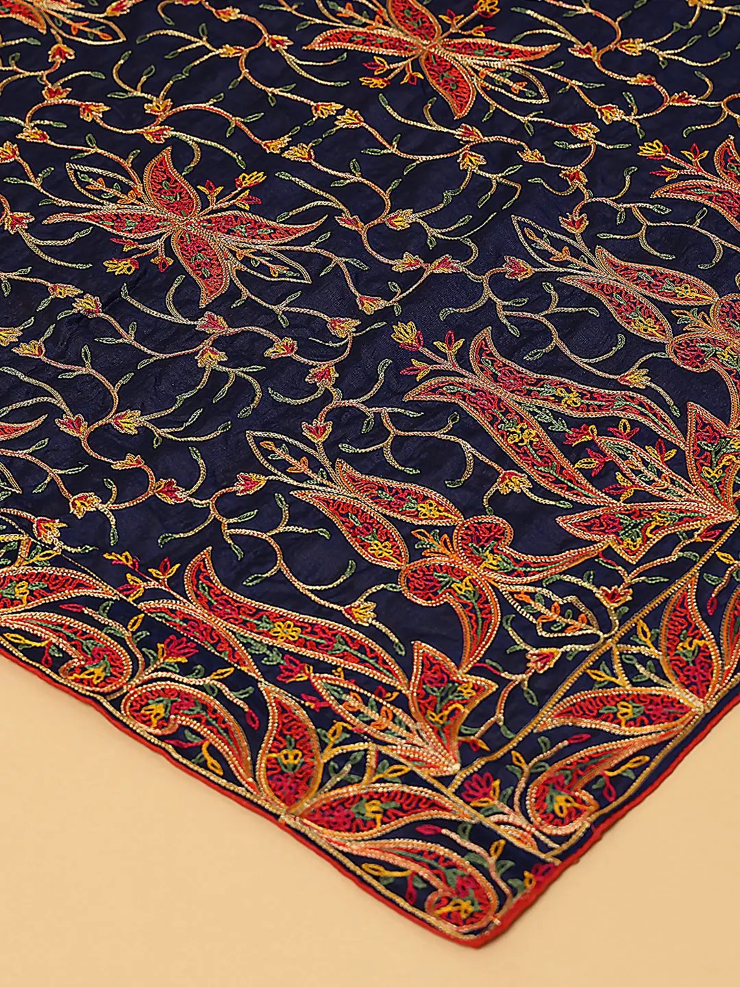 Close-up of navy chiffon dupatta's threadwork details.