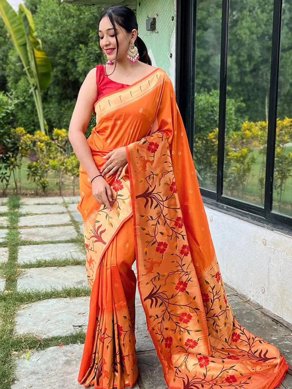 Orange Paithani saree with big border and floral design