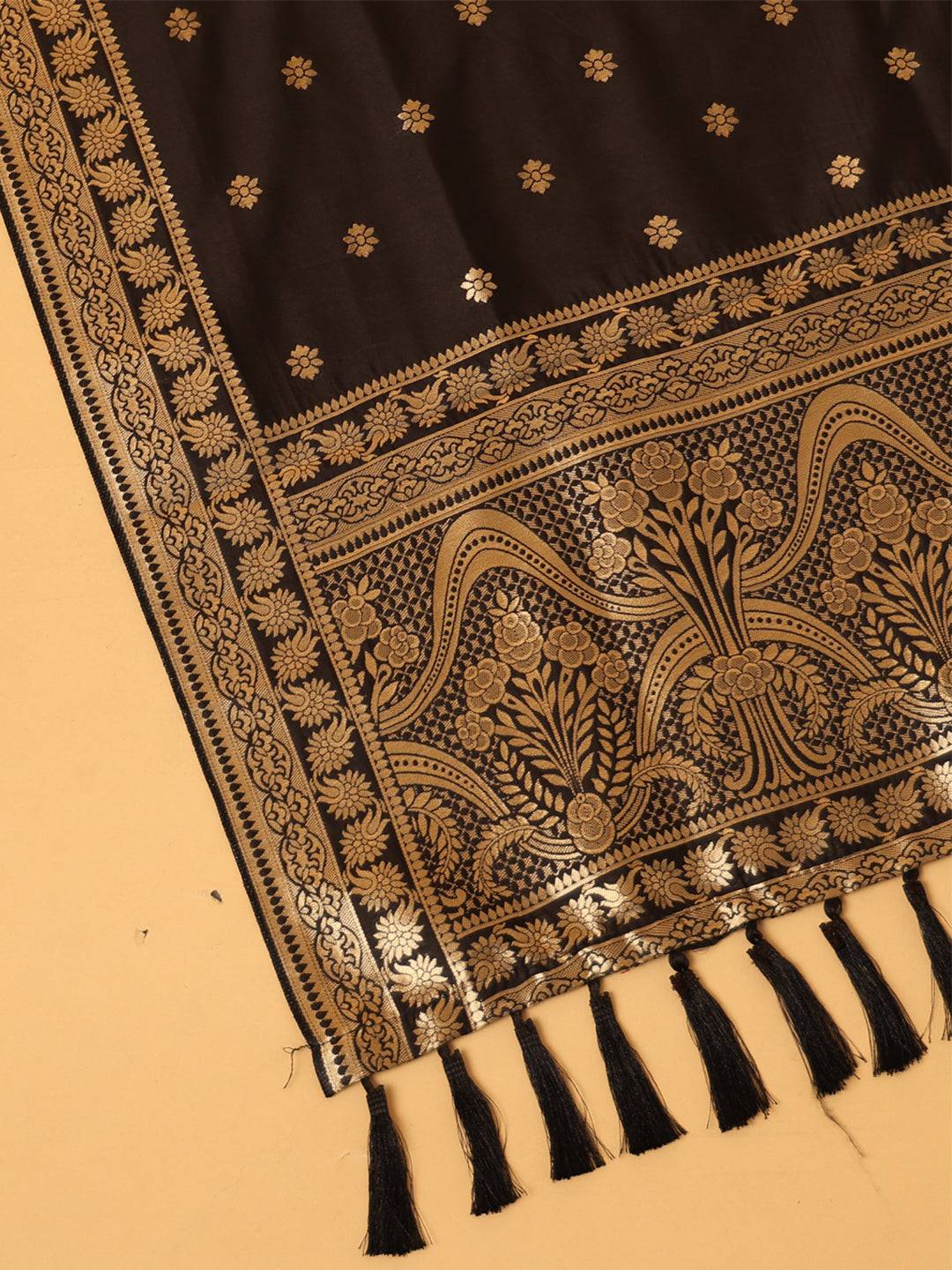 Close-up of woven design silk blend black dupatta.