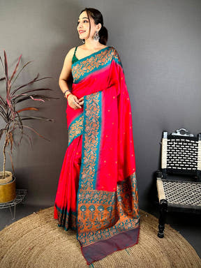 Pink Silk Saree with Gold Floral Border on Gray Background