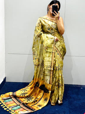 Light green Kota Doriya silk saree with intricate floral patterns