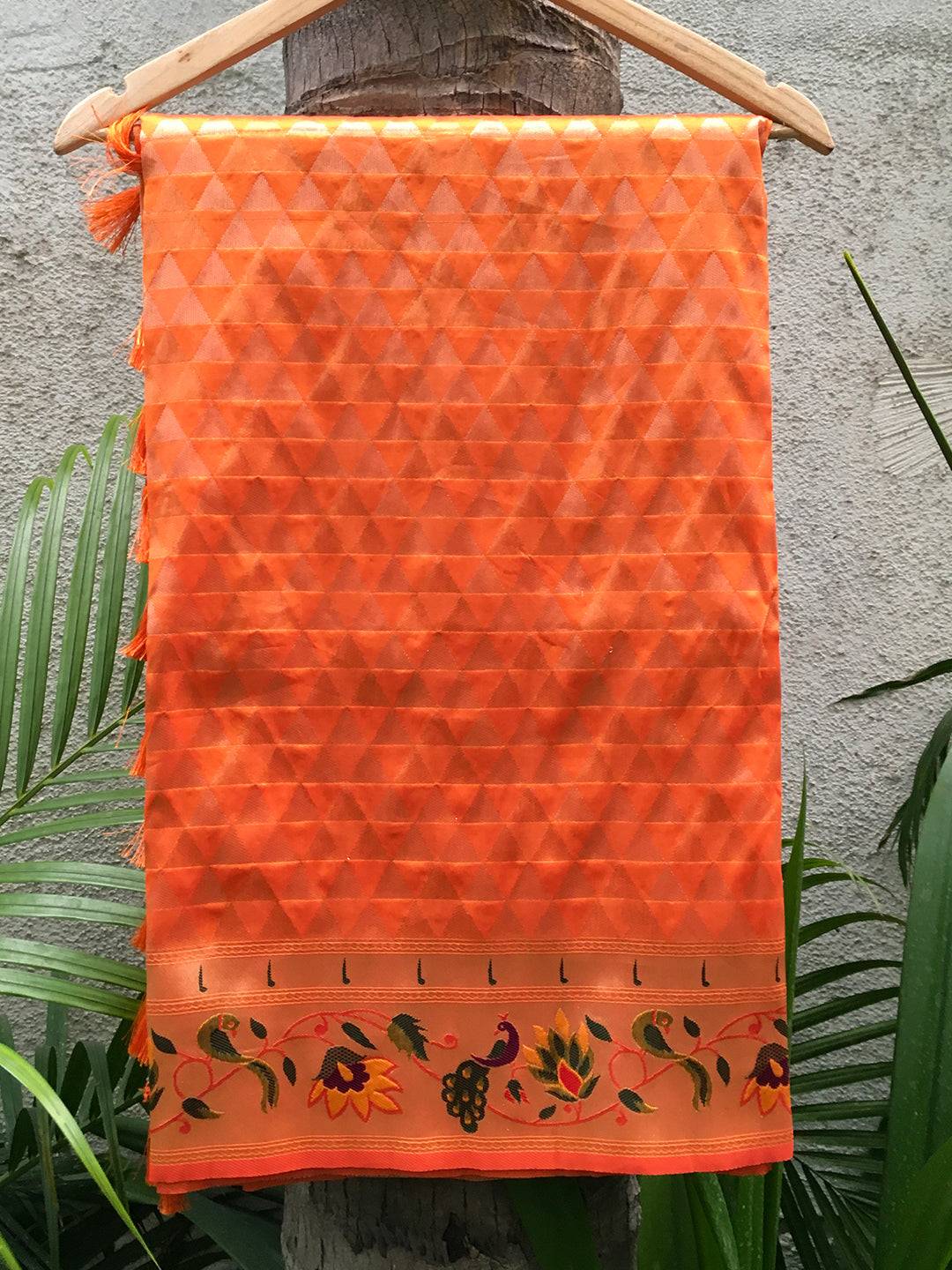 Orange silk blend Paithani saree with woven zari work