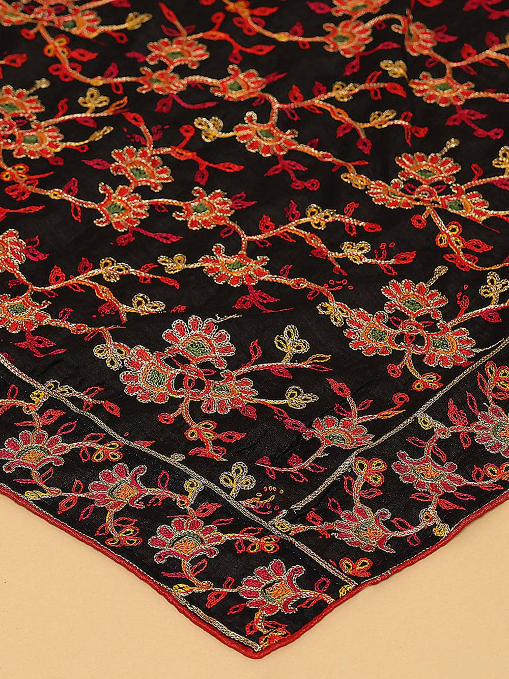 Close-up of black chiffon dupatta showcasing detailed threadwork.