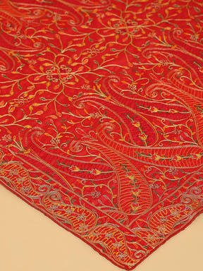 Close-up of red dupatta with detailed pashmina threadwork