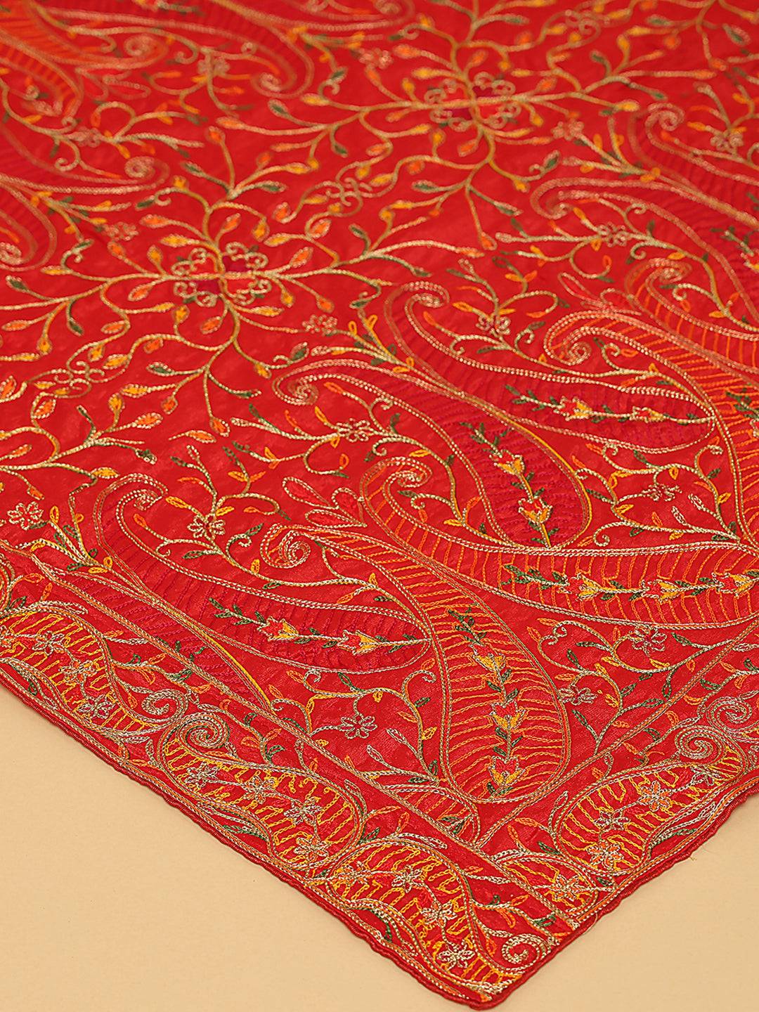 Close-up of red dupatta with detailed pashmina threadwork