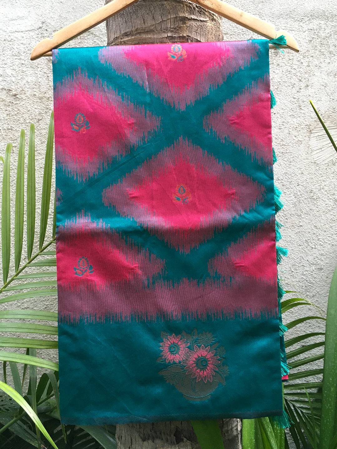 Close-up of Rani Tussar Silk Ikkat Weaving Saree fabric.