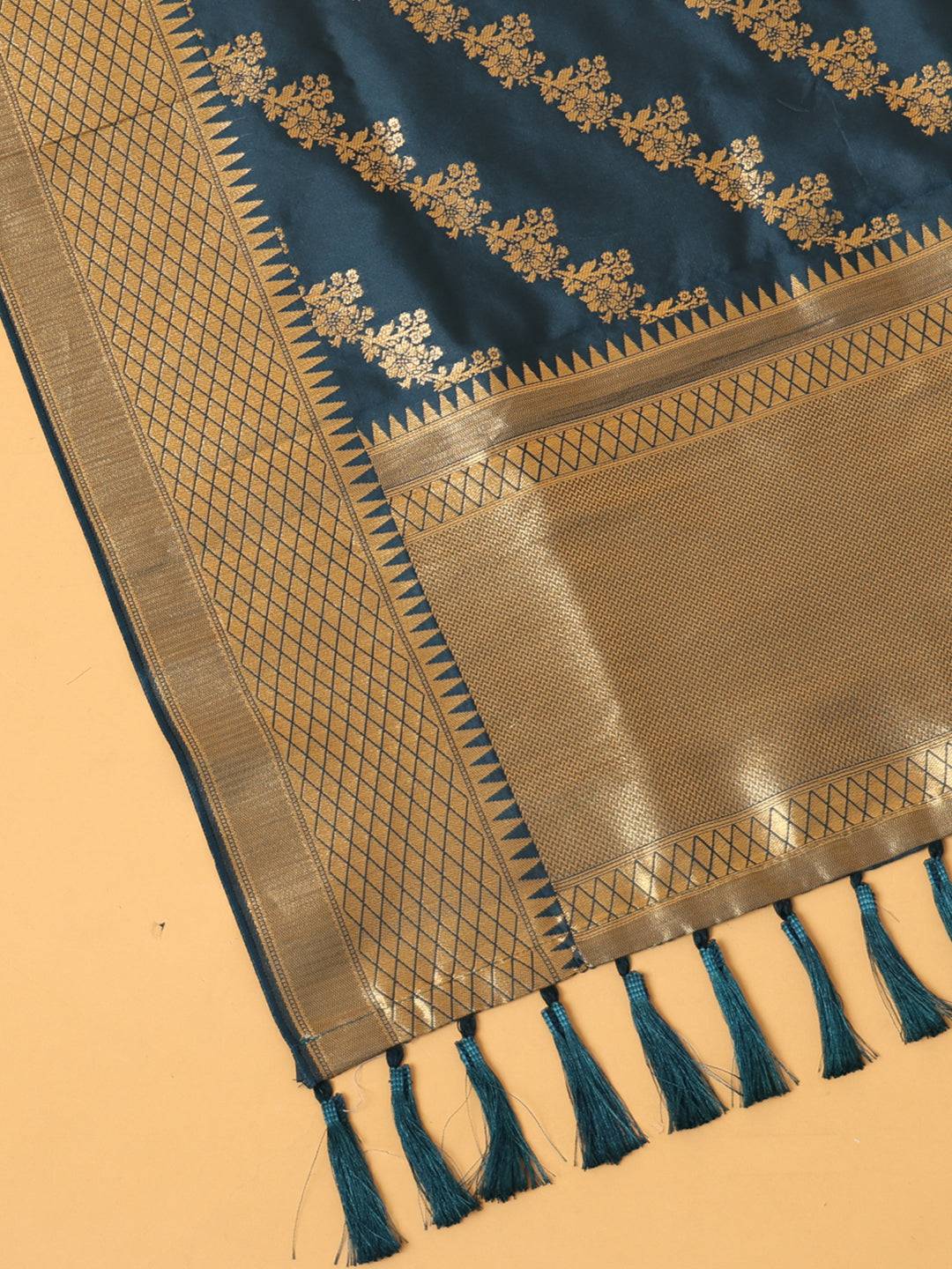 Close-up of teal woven design dupatta fabric