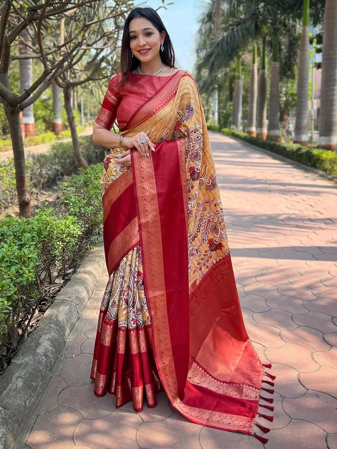 Elegant mustard and red Banarasi saree with intricate chex weaving.