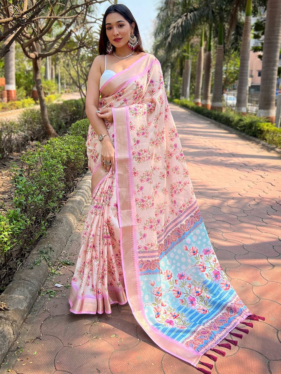 Peach Kota saree with digital floral print, worn by a model