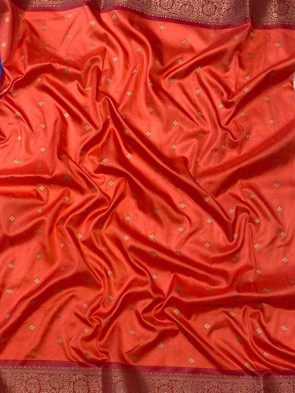 Detailed view of red Patola pallu on Banarasi silk saree