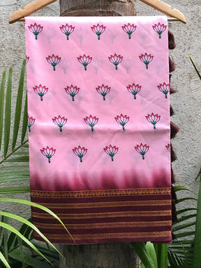 Pink 2 Ton Lotus Print Silk Saree hanging on a hanger