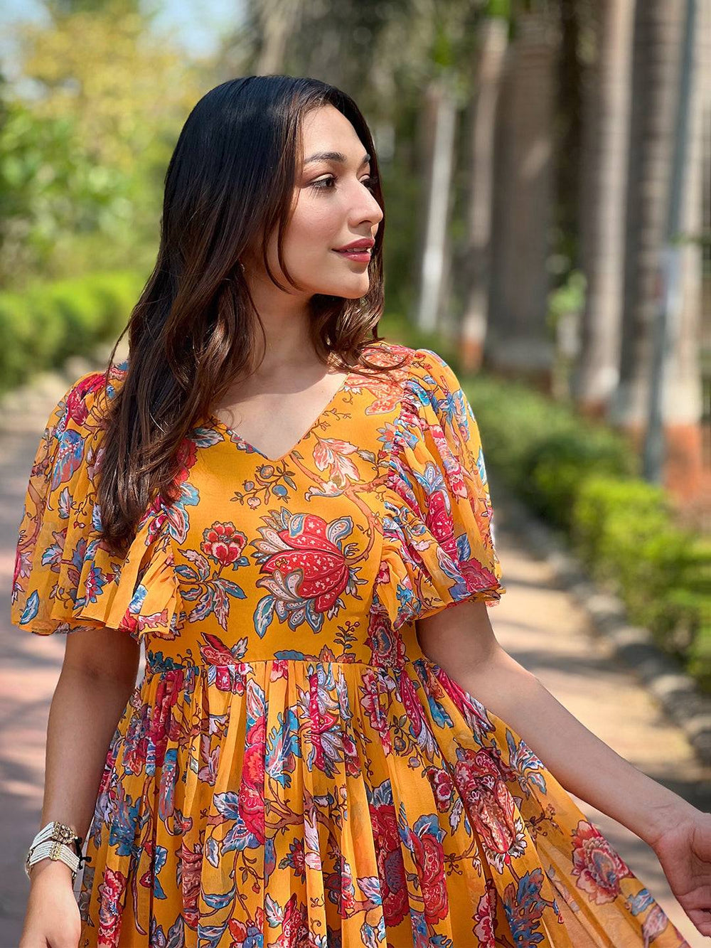 Model in Honey Yellow Chints Flower Dress smiling