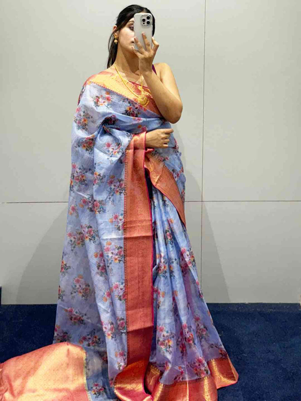 Model wearing light purple floral print Kota silk saree
