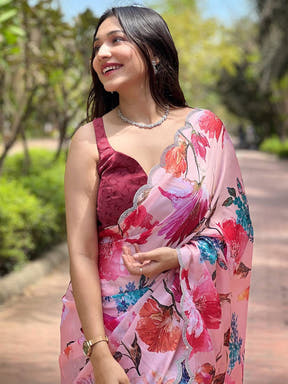 Peach satin georgette saree with floral print