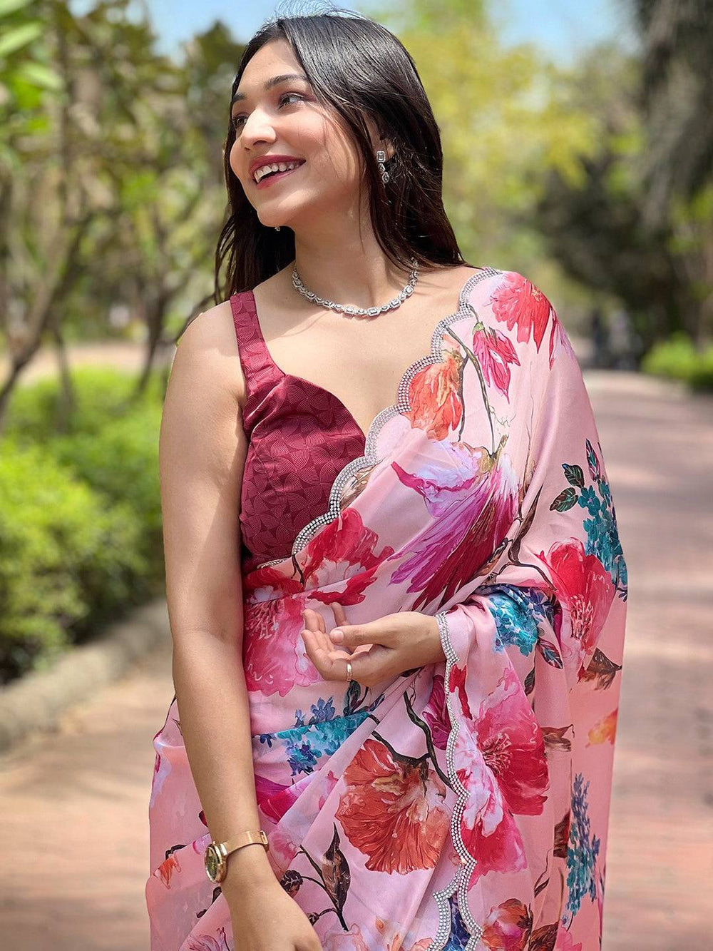 Peach satin georgette saree with floral print