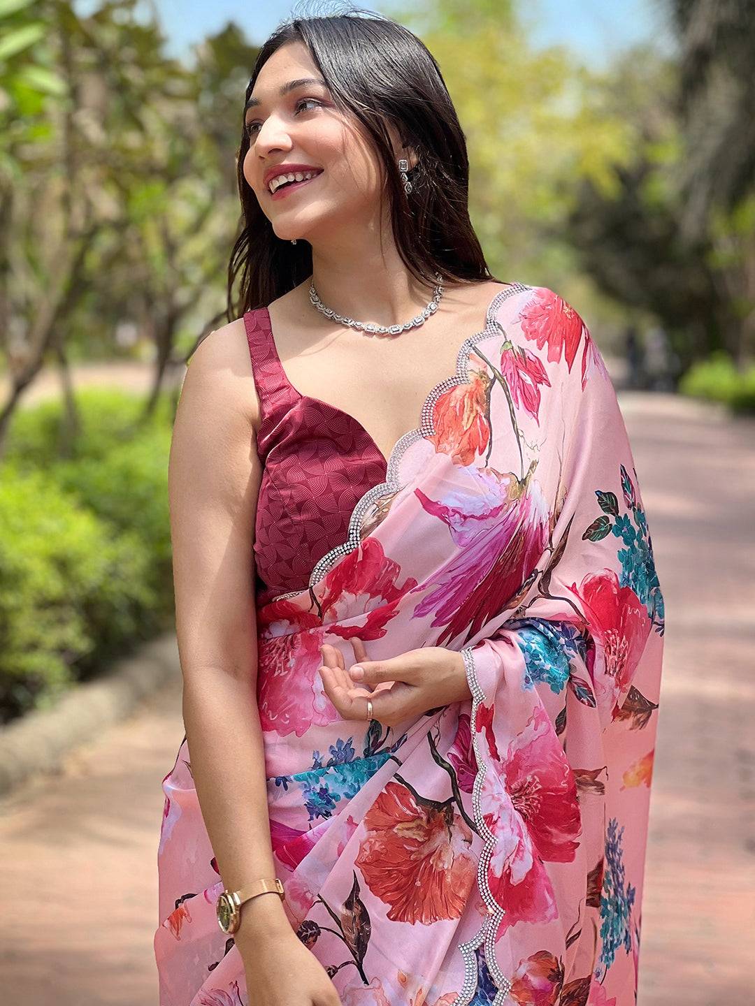 Peach satin georgette saree with floral print