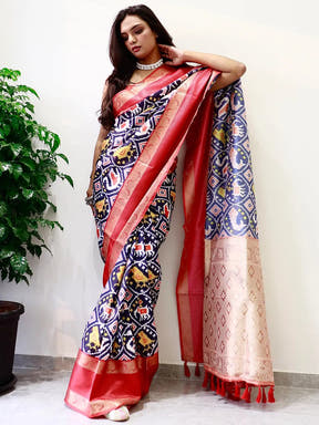 Stylish Pochampally print saree with red Gadwal border