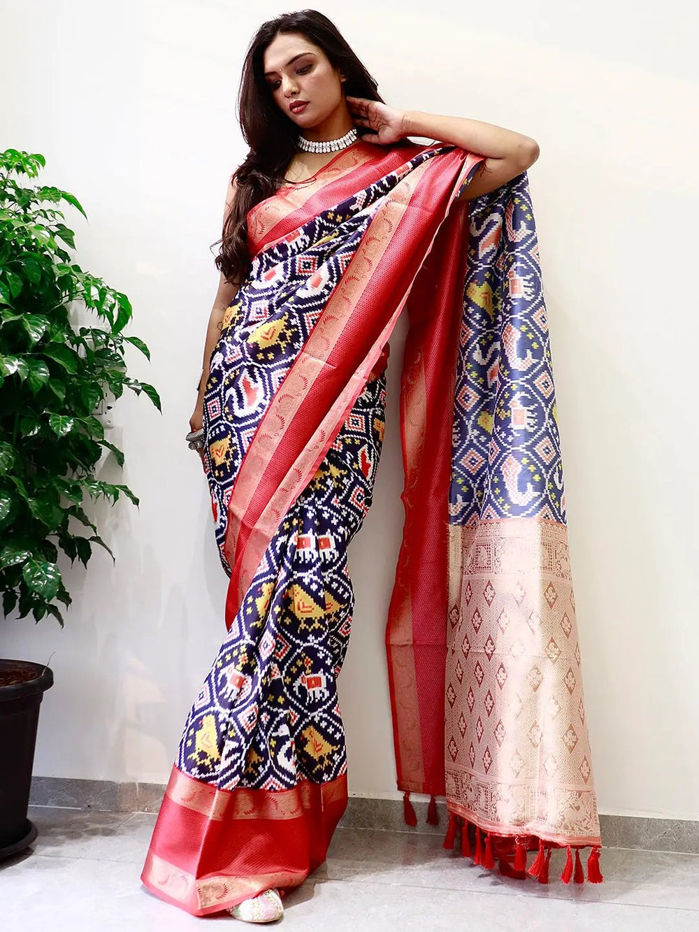 Stylish Pochampally print saree with red Gadwal border