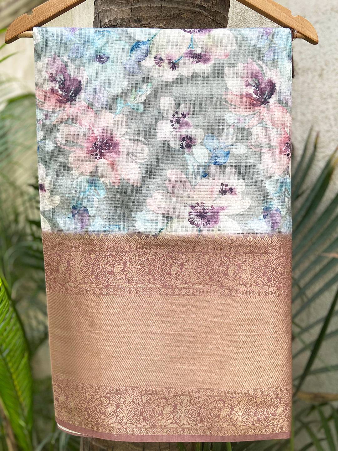 Pista Kota Doriya saree with floral print and gold zari border