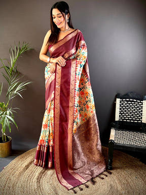 Elegant maroon Banarasi saree with intricate Pattu Zari border