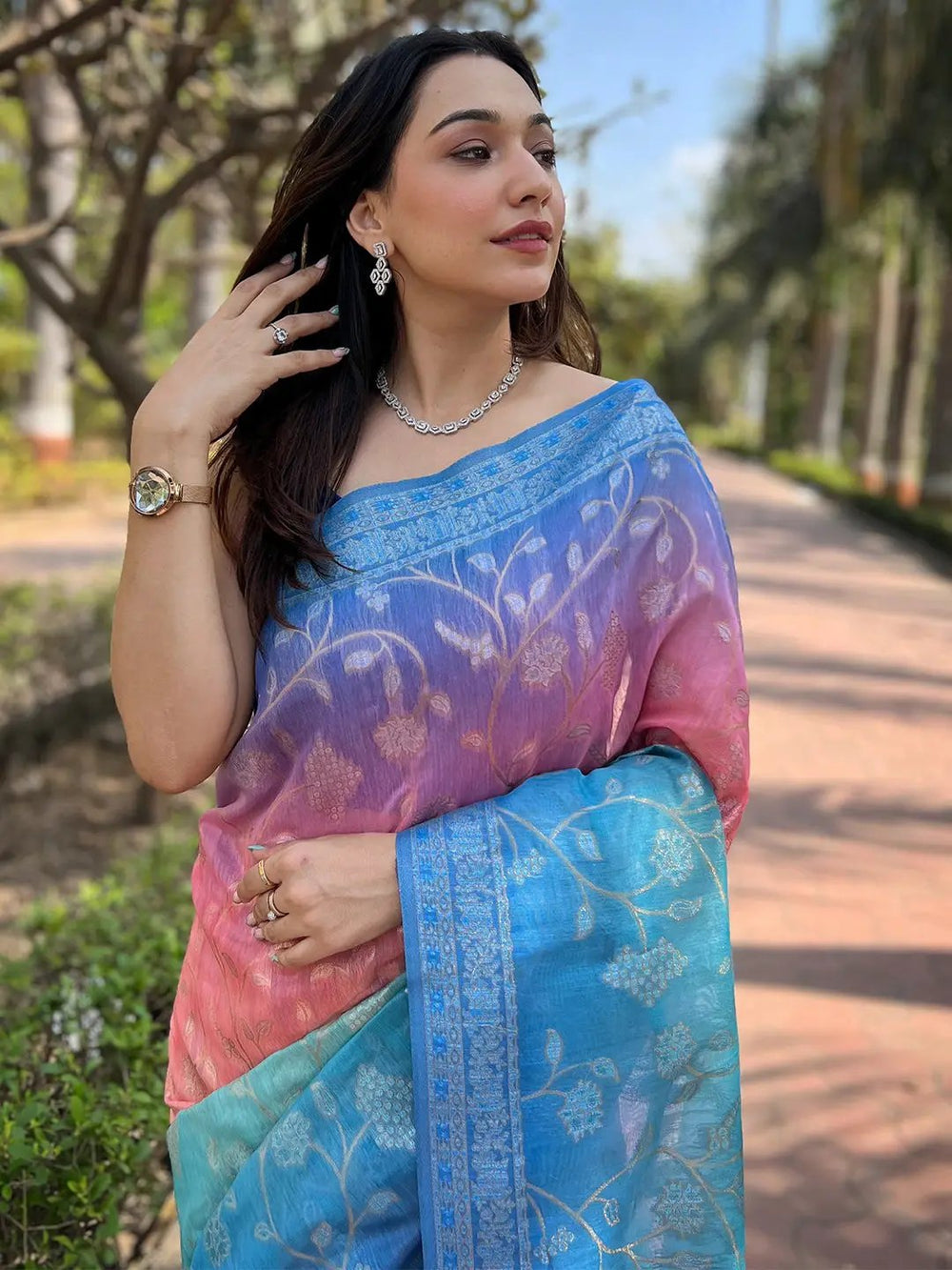 Close-up of multi-color saree with intricate Lakhnavi design
