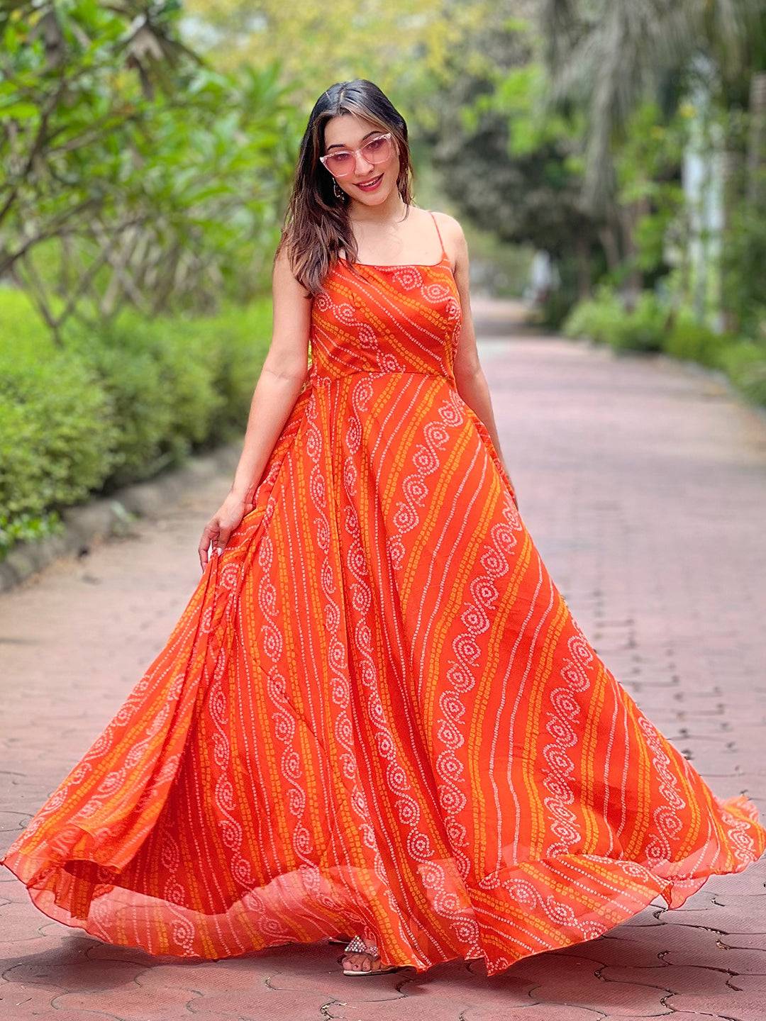 Woman in Portland Orange Bandhej Print Dress outdoors