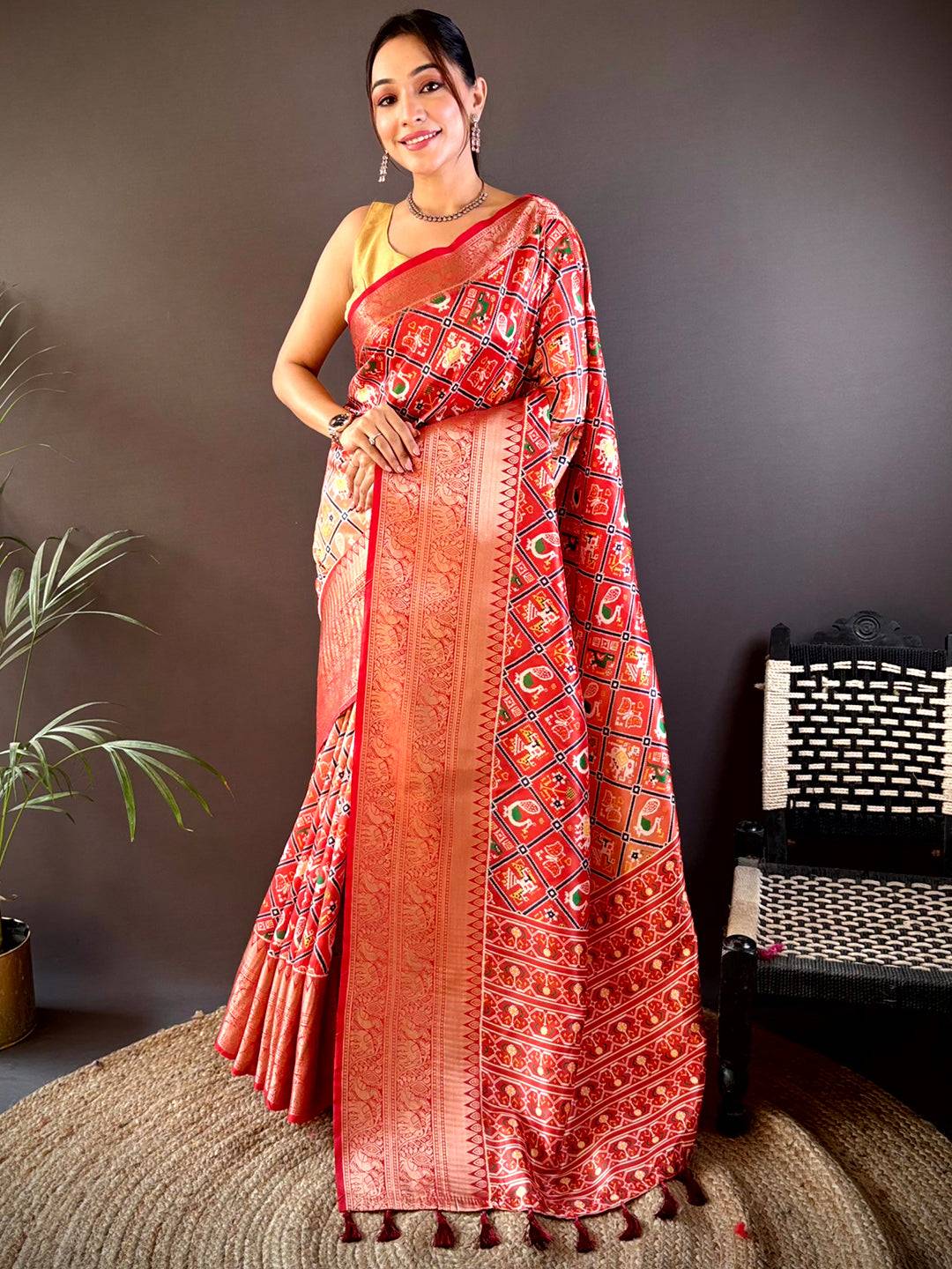 Elegant Ombre Red Silk Saree showcasing Patola prints