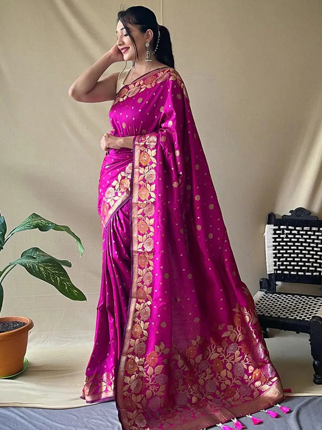 Beautiful pink silk saree with intricate zari patterns