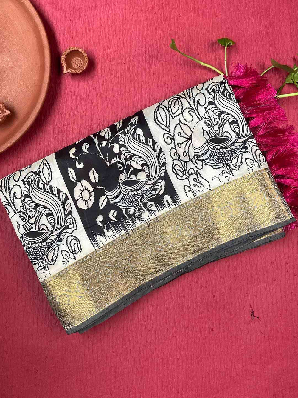 Folded Kalamkari saree with intricate block print details