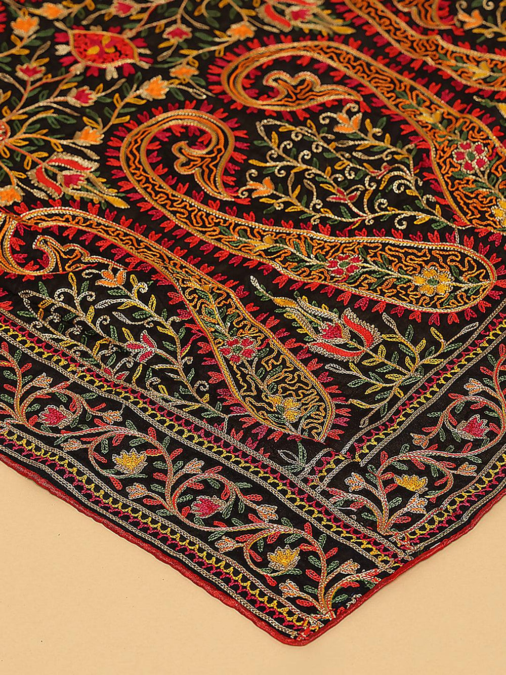 Close-up of intricate pashmina threadwork on black dupatta