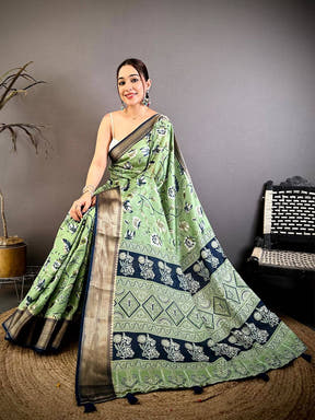 Pista Soft Dola Silk Floral Kanchi Border Saree