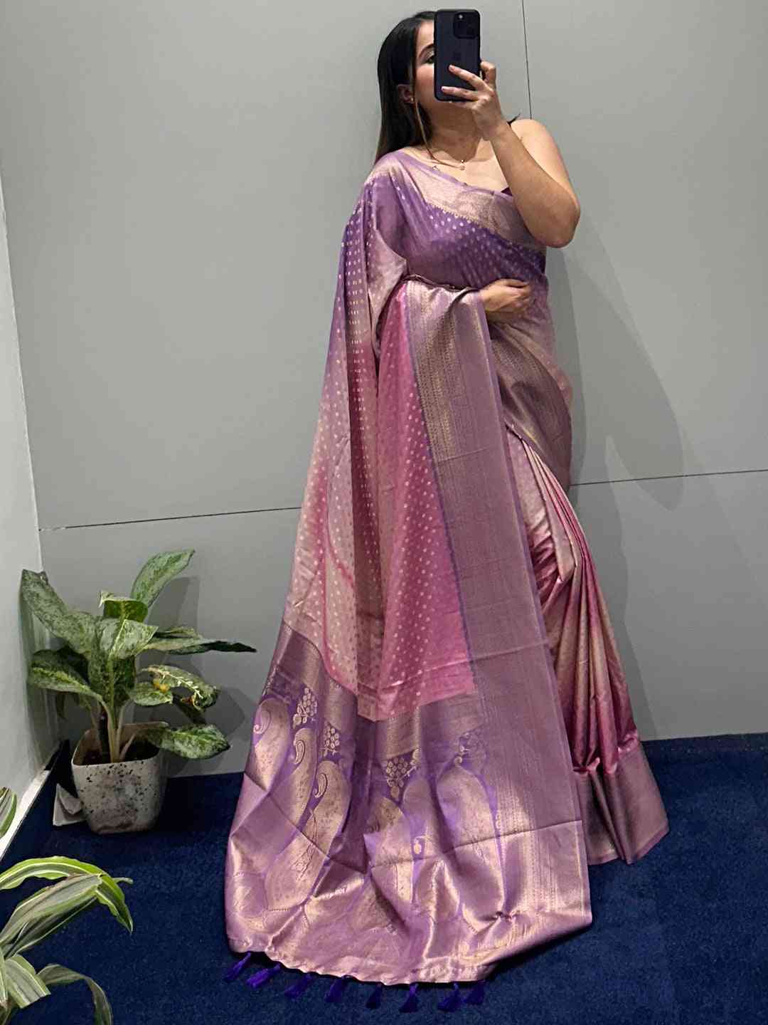 Violet Banarasi ombre saree displayed indoors