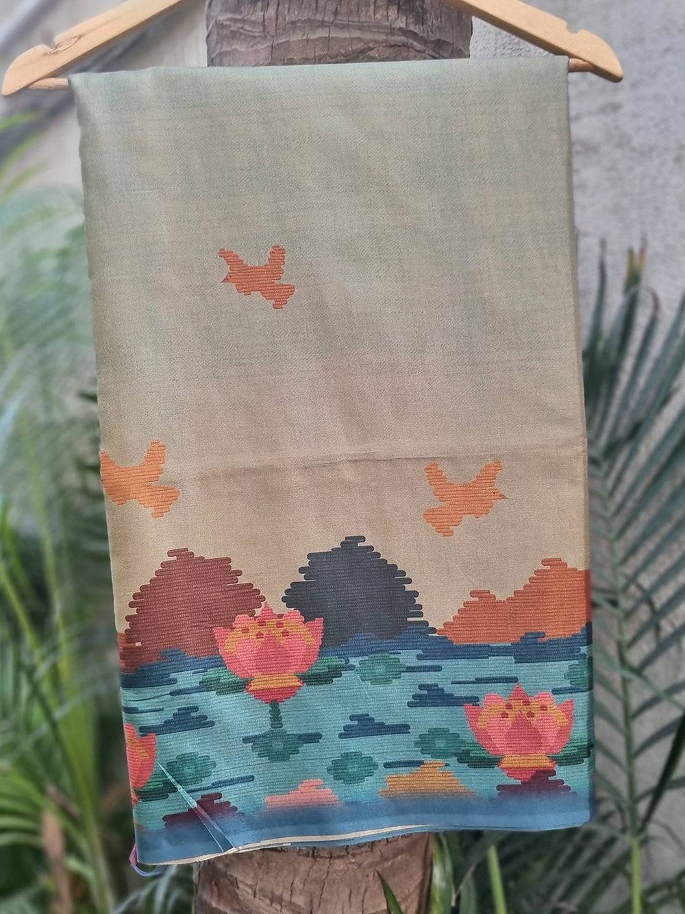 Tussar silk saree with teal freehand Ikkat and Kalamkari print