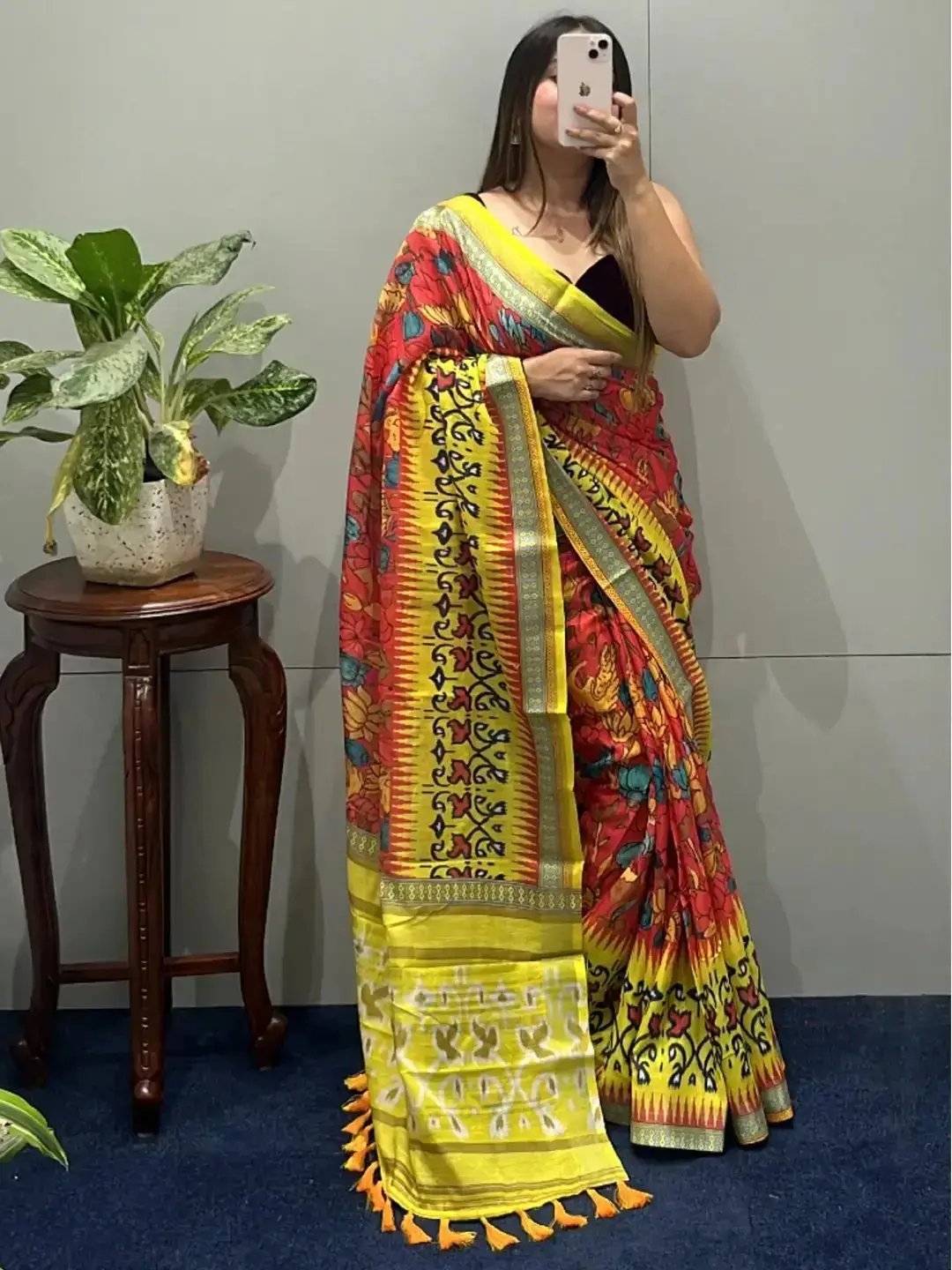 Stylish floral Ikkat saree with bold yellow border