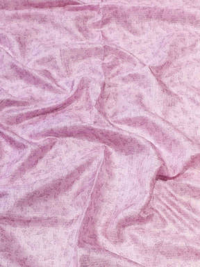 Fabric detail of peach Kota saree with subtle floral print