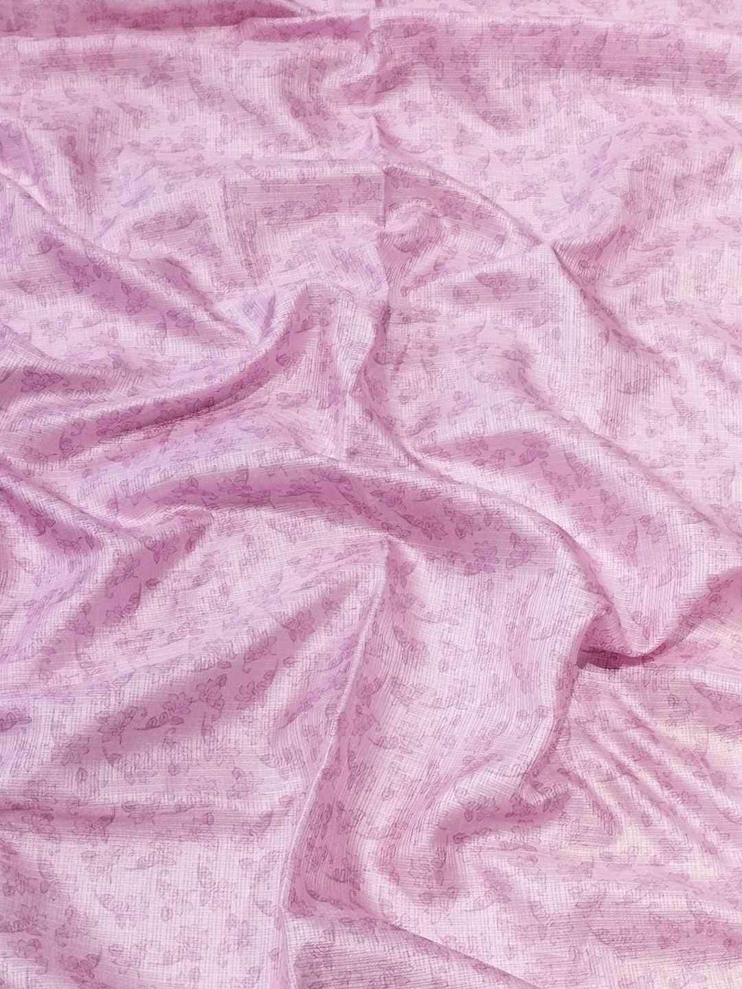 Fabric detail of peach Kota saree with subtle floral print