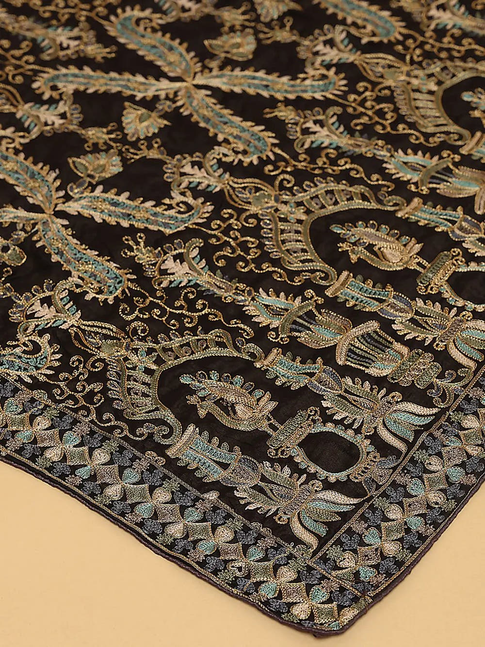 Close-up of intricate resham thread embroidery on dupatta