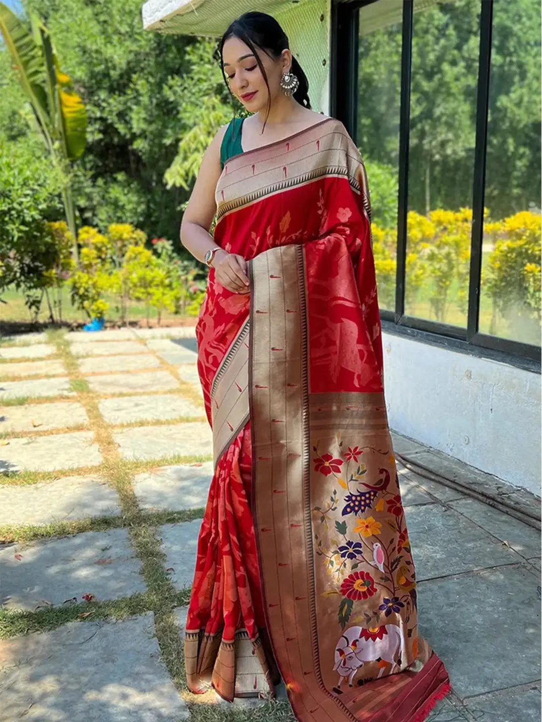 Full view of red Paithani silk saree with intricate pallu design