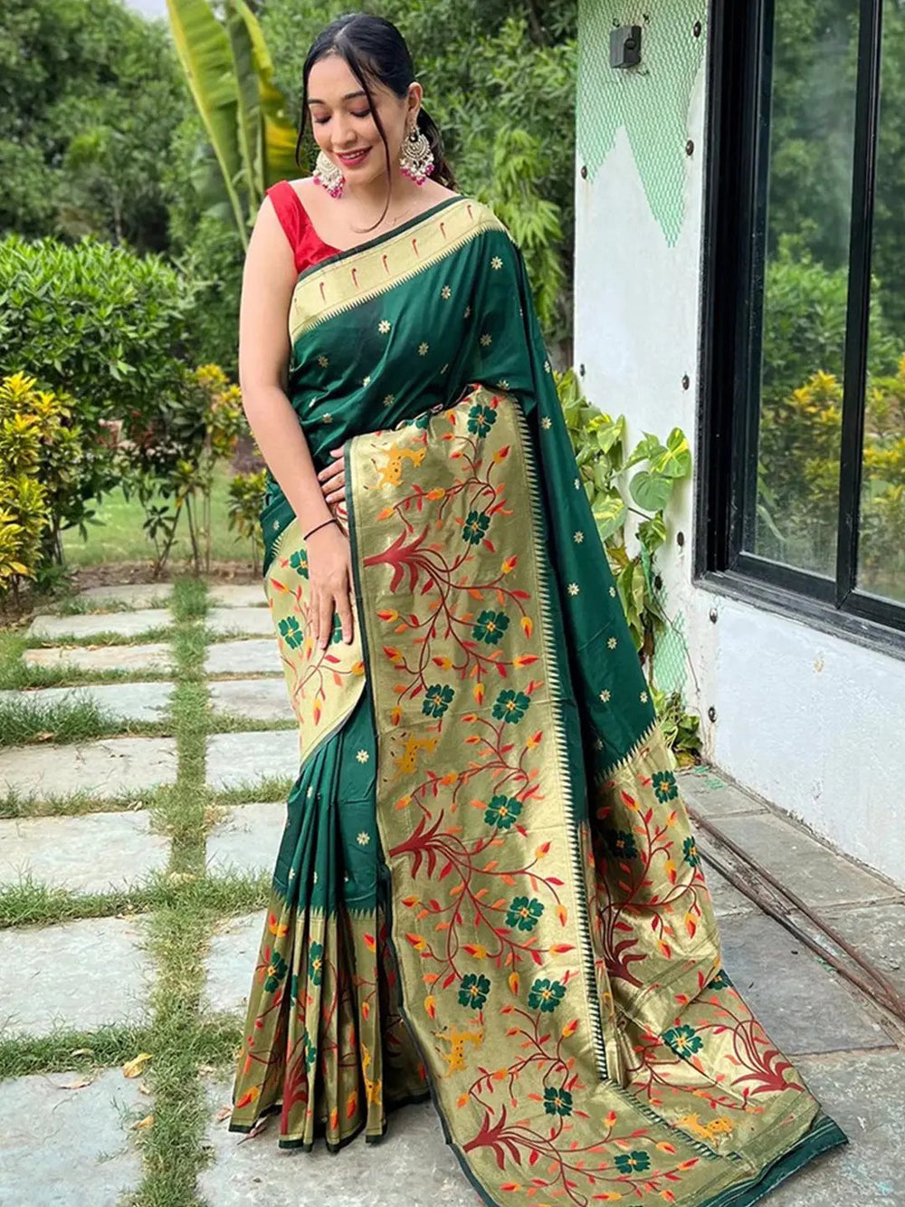 Dark green Paithani saree with big border and floral design