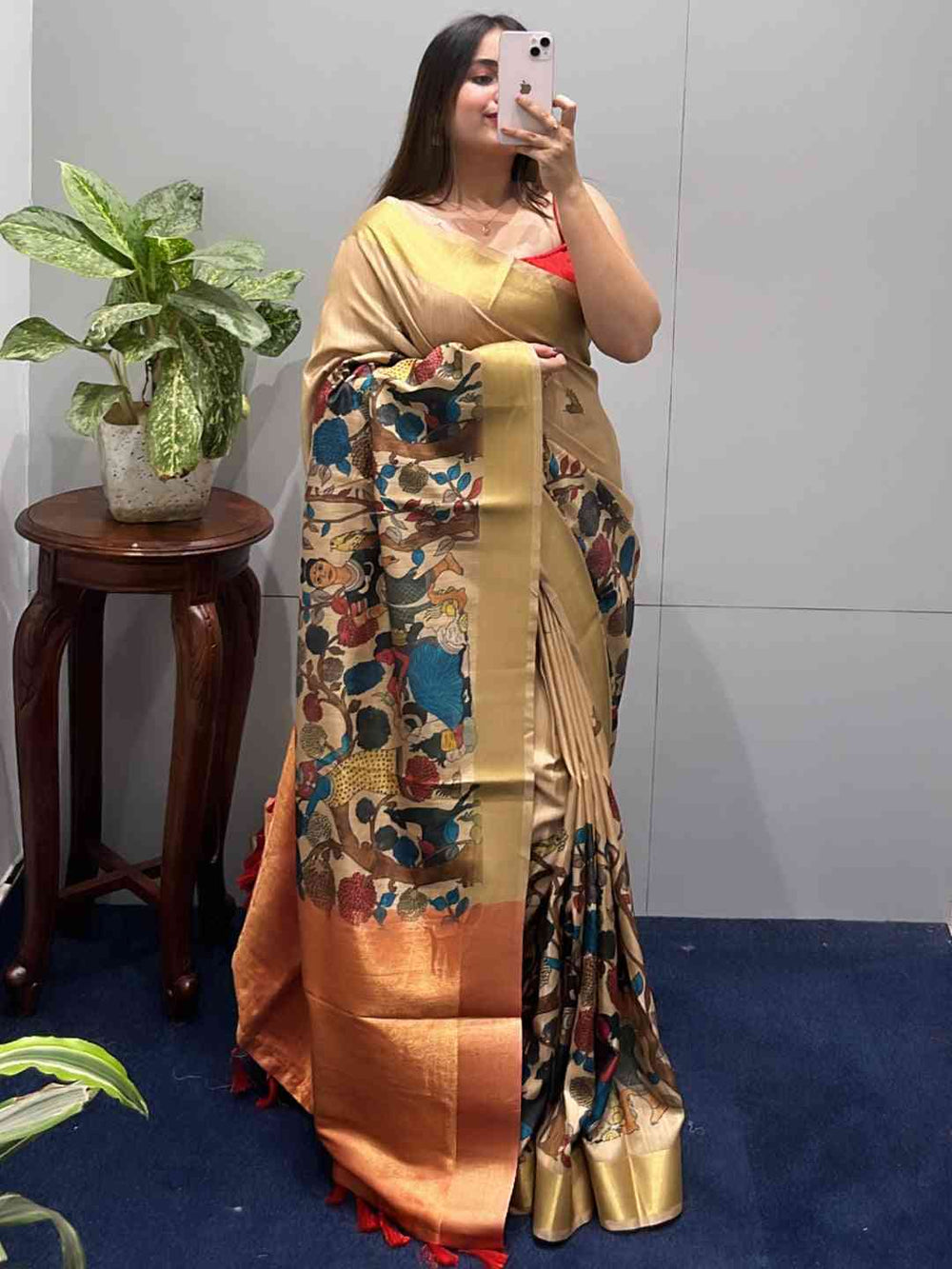 Beautiful Kalamkari saree in linen tissue with vibrant floral motifs