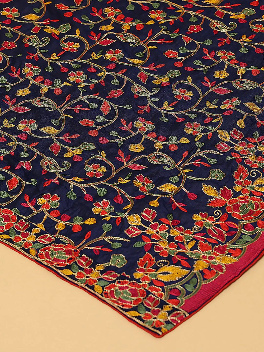 Close-up of navy chiffon dupatta with vibrant embroidery