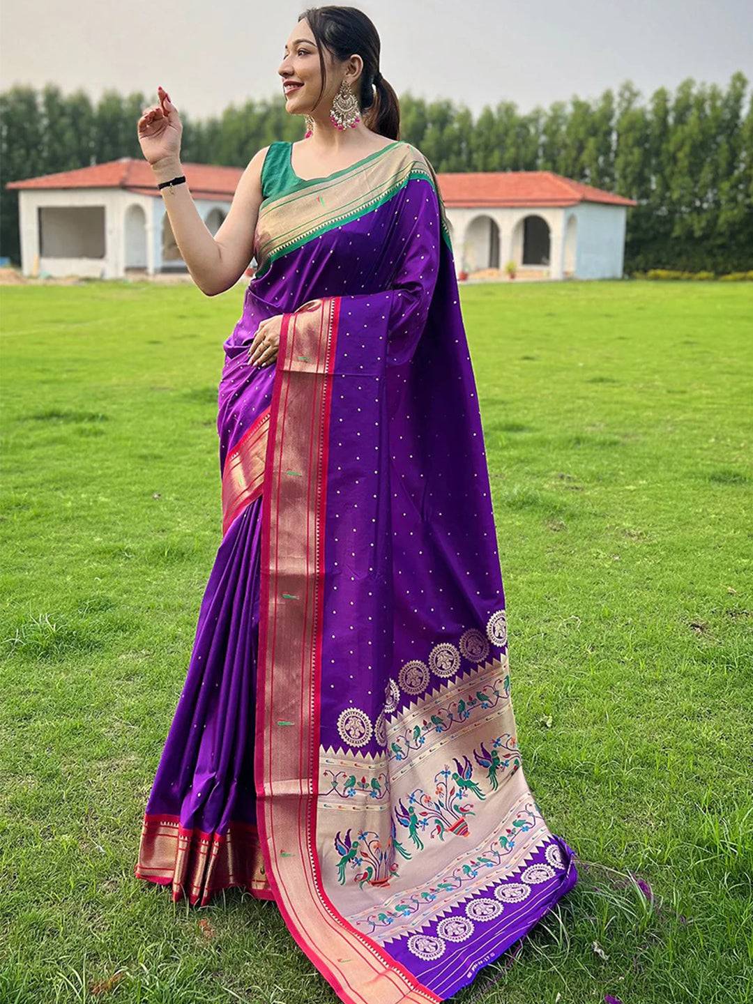 Purple Paithani saree with intricate Ganga Jamuna border design