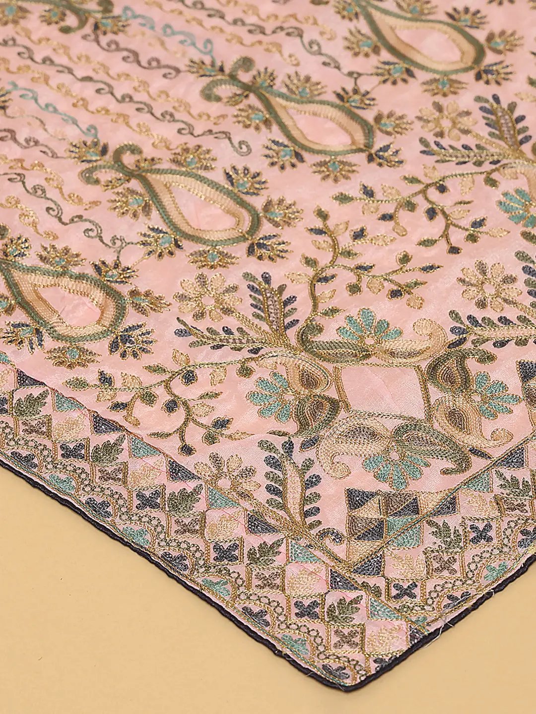 Close-up of pink chiffon dupatta with floral threadwork