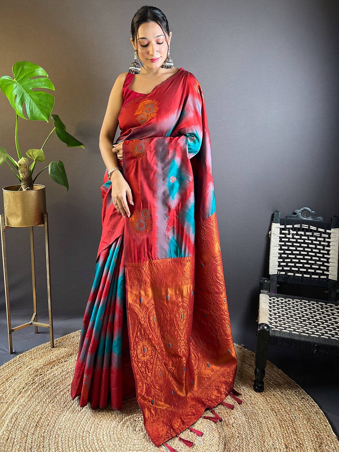 Elegant Banarasi Saree in teal and red with Ikkat design