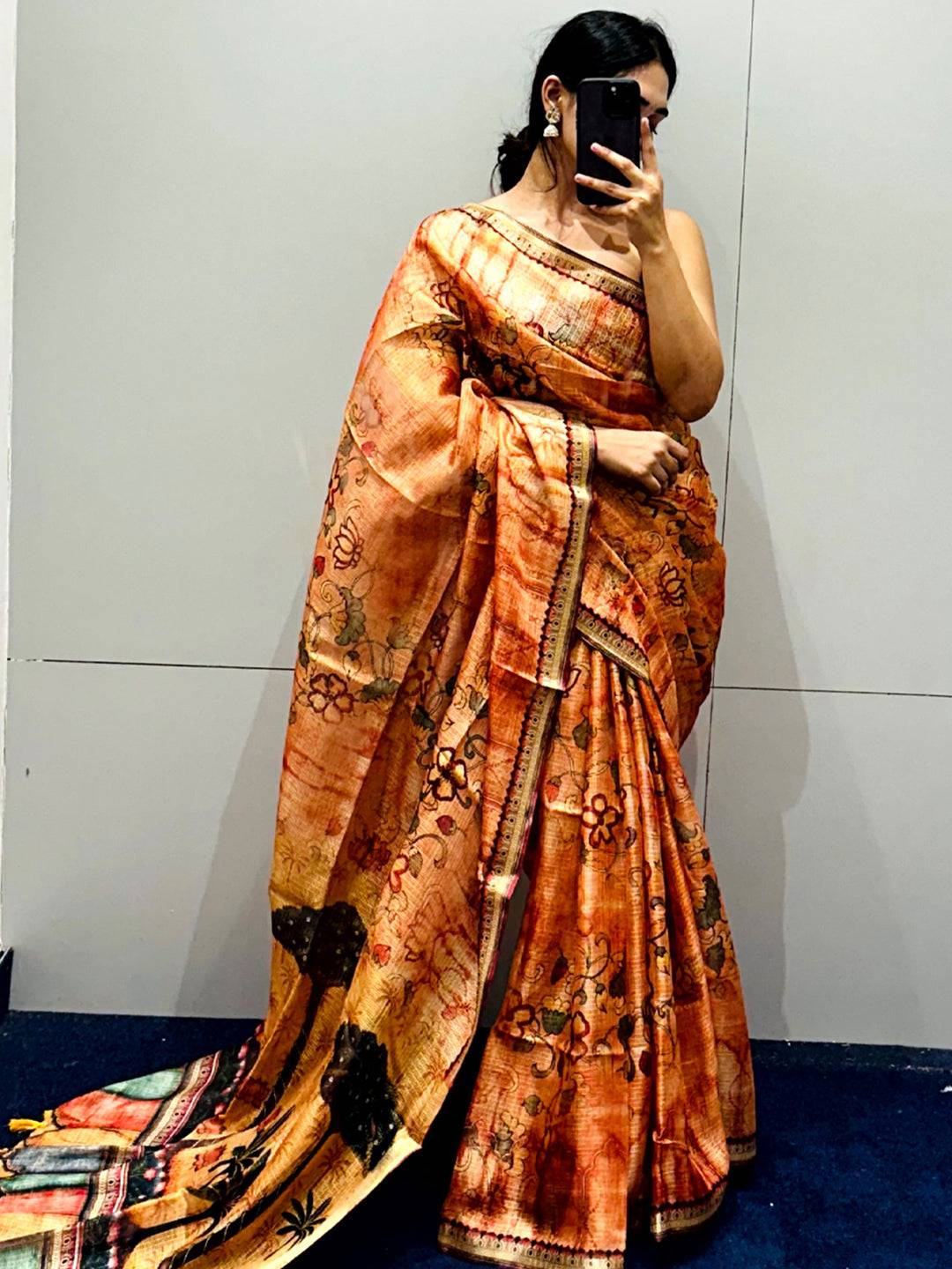 Orange Kota Doriya silk saree with floral print, full view.