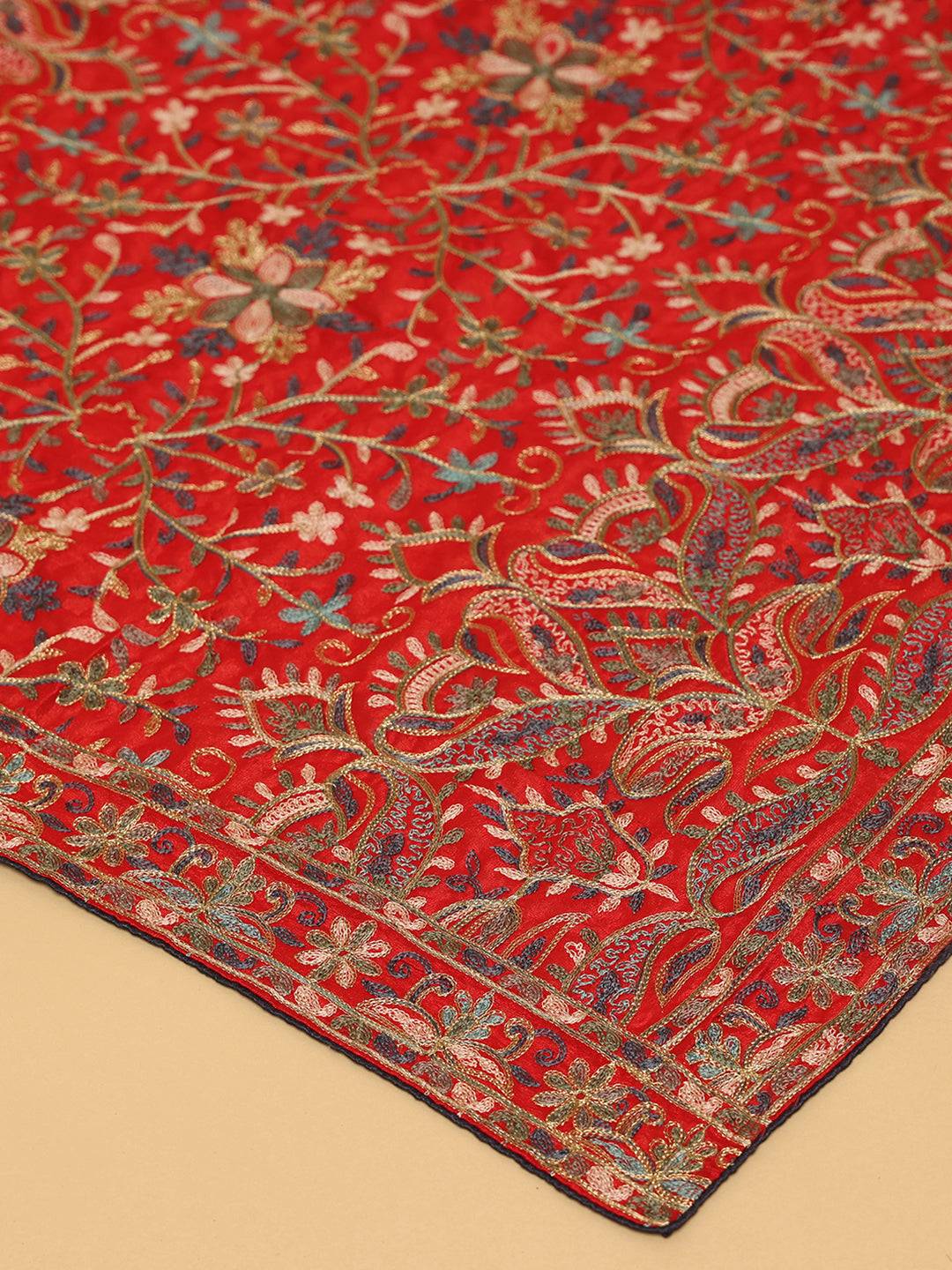 Close-up of red poly chiffon pashmina dupatta's intricate embroidery