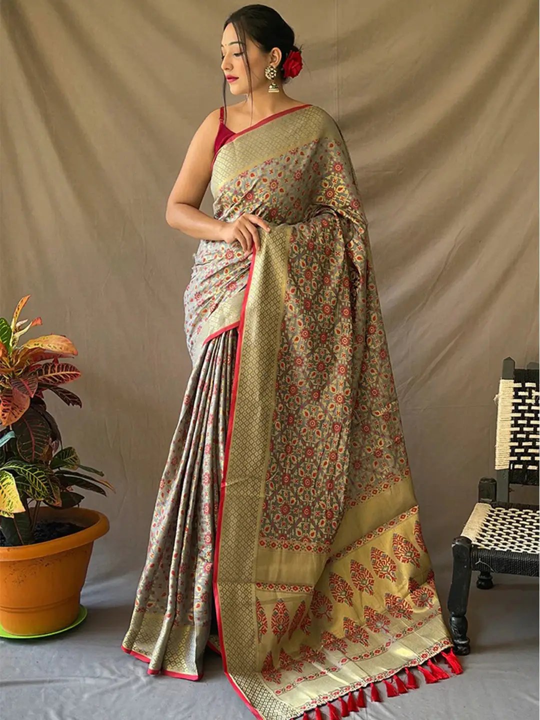 Elegant grey Rajkoti Patola silk saree with zari woven design