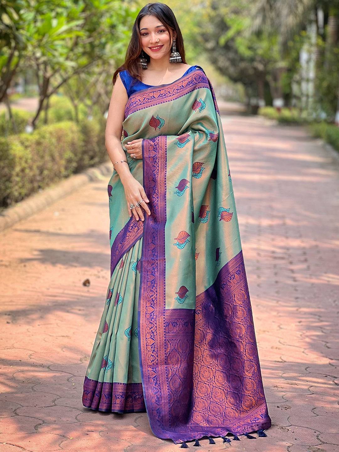 Full view of pista Kanjivaram saree with intricate gold zari design.