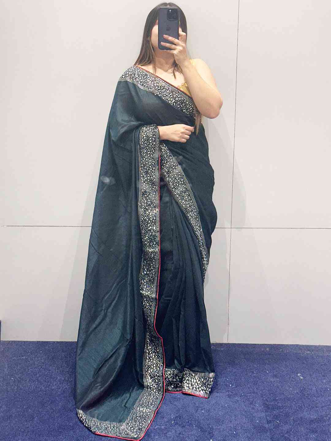 Dark green Vichitra silk saree with Swarovski stones, mirror selfie